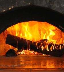 Vente de pizzas cuites au feu de bois